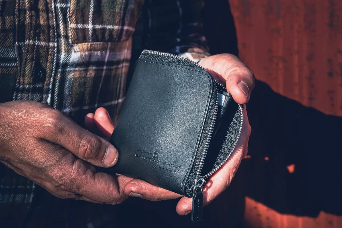 Die Carry Leder-Geldbörse mit Reißverschluss