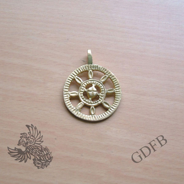 Römischer Radfibelanhänger aus Messing, 3,5 cm Durchmesser